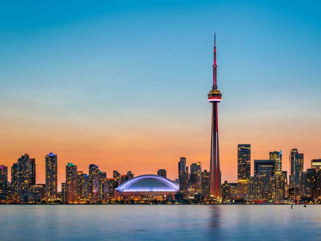 Skyline of Toronto over Ontario Lake at twilight