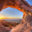 Sunrise at Partition Arch, in Arches National Park.