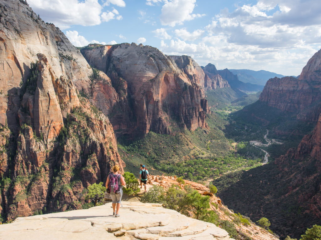 Hikers on Canyon view point in Zion National Park on a summer day