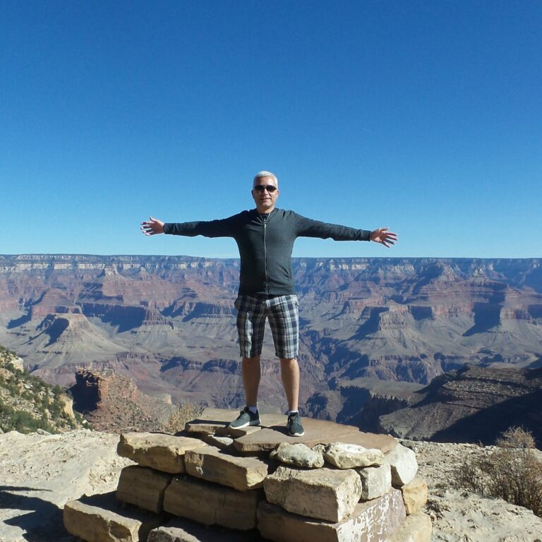 Bo standing over the Grand Canyon