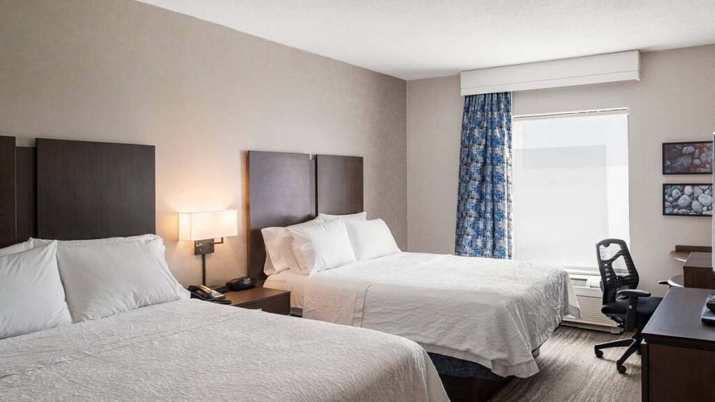 Hotel guest room with two beds