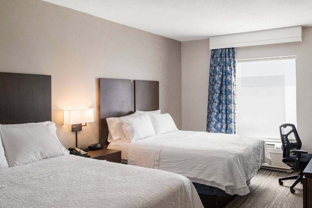 Hotel guest room with two beds