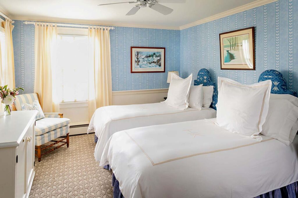 Hotel guest room with two beds