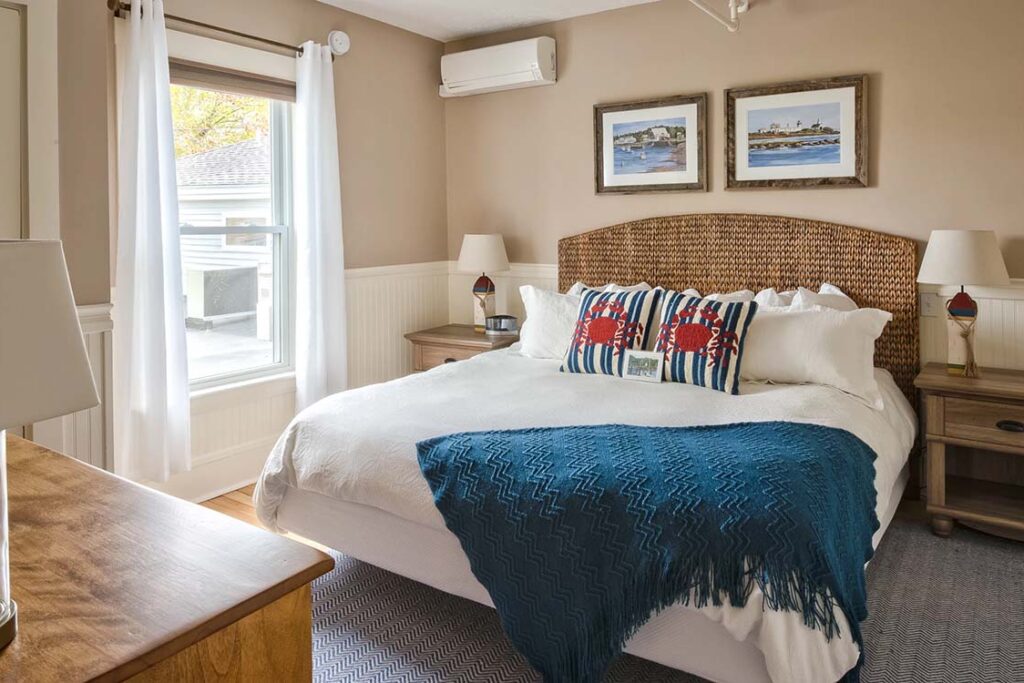 Ocean themed guest room with king bed