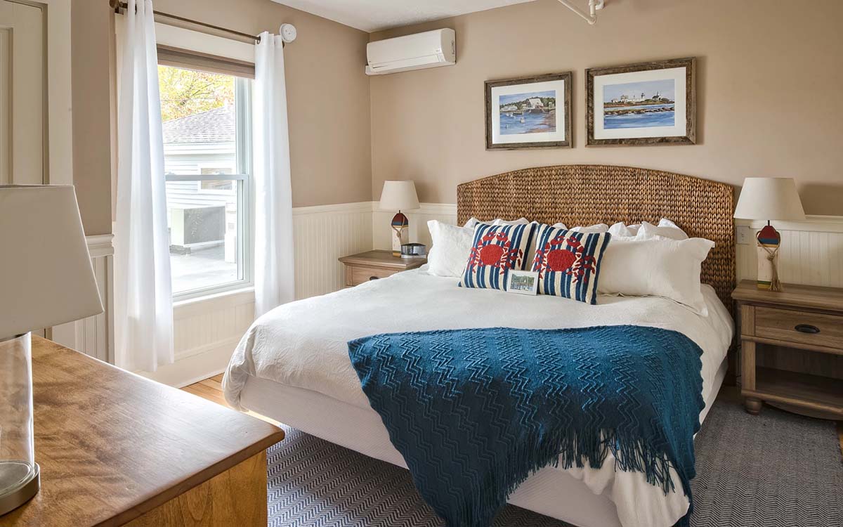 Ocean themed guest room with king bed