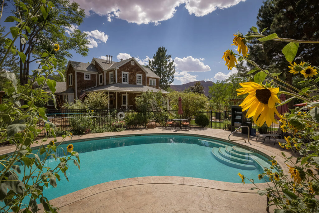 Inn exterior with a view of the pool