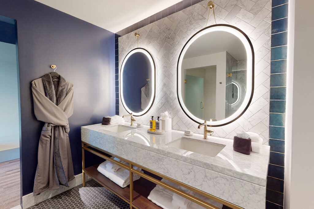 Guest room with two sink bathroom