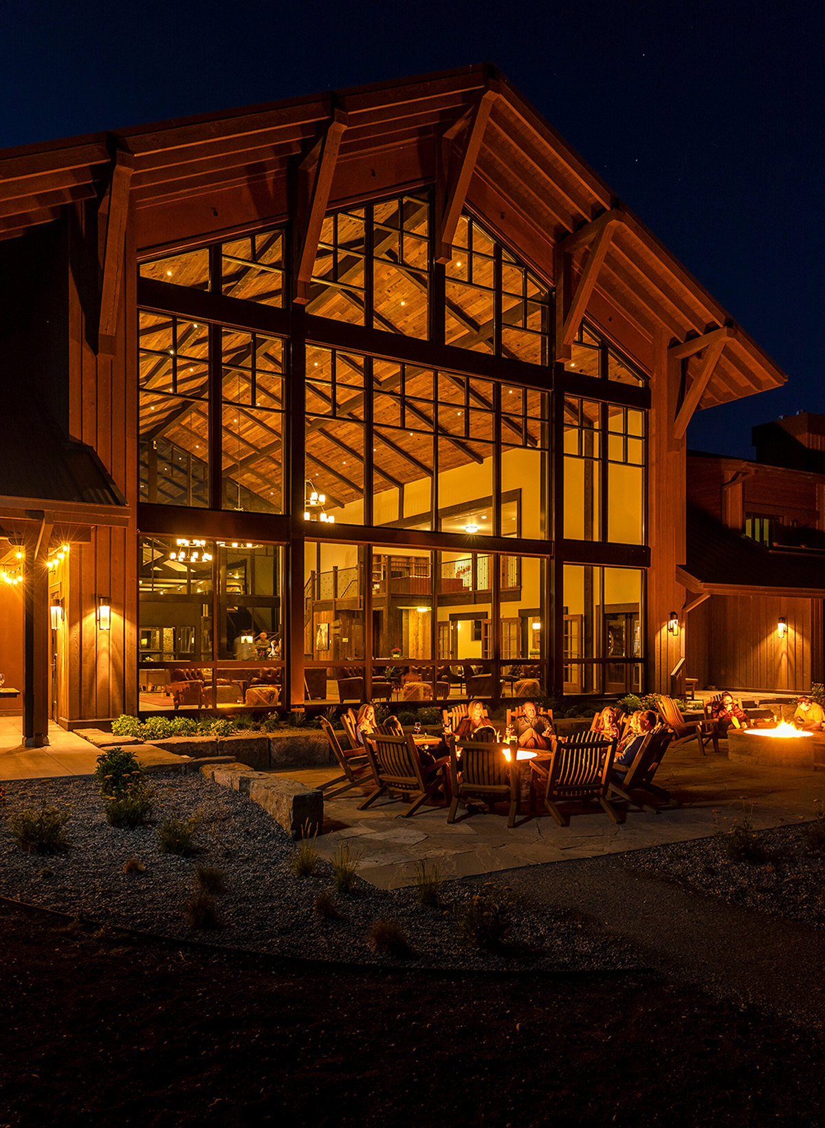 Hotel firepits lit at night