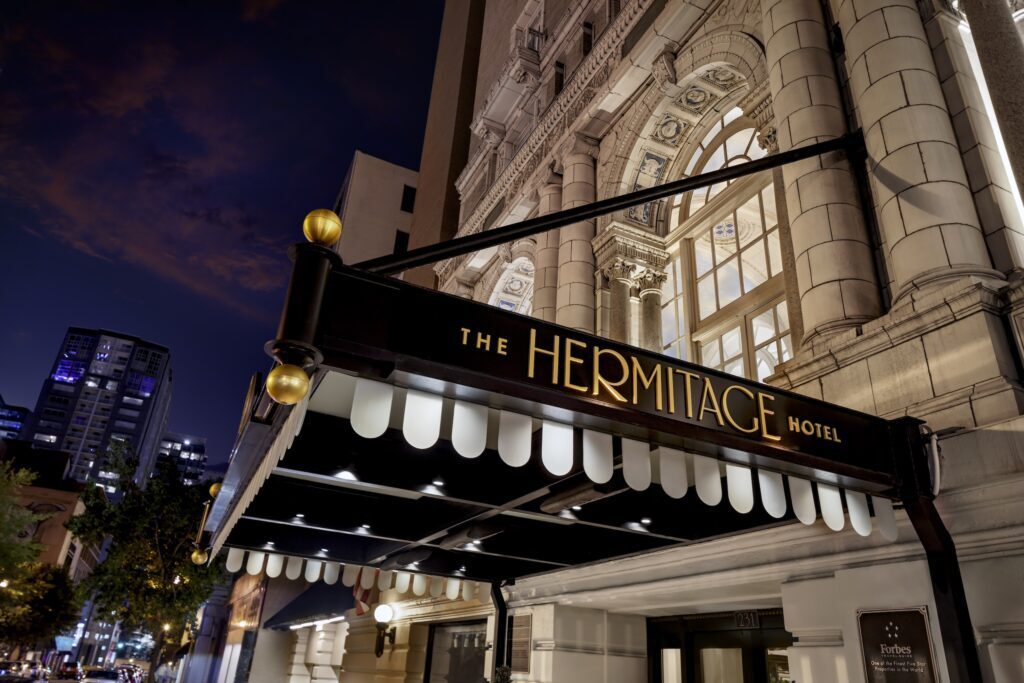 Hotel entrance showing hotel sign