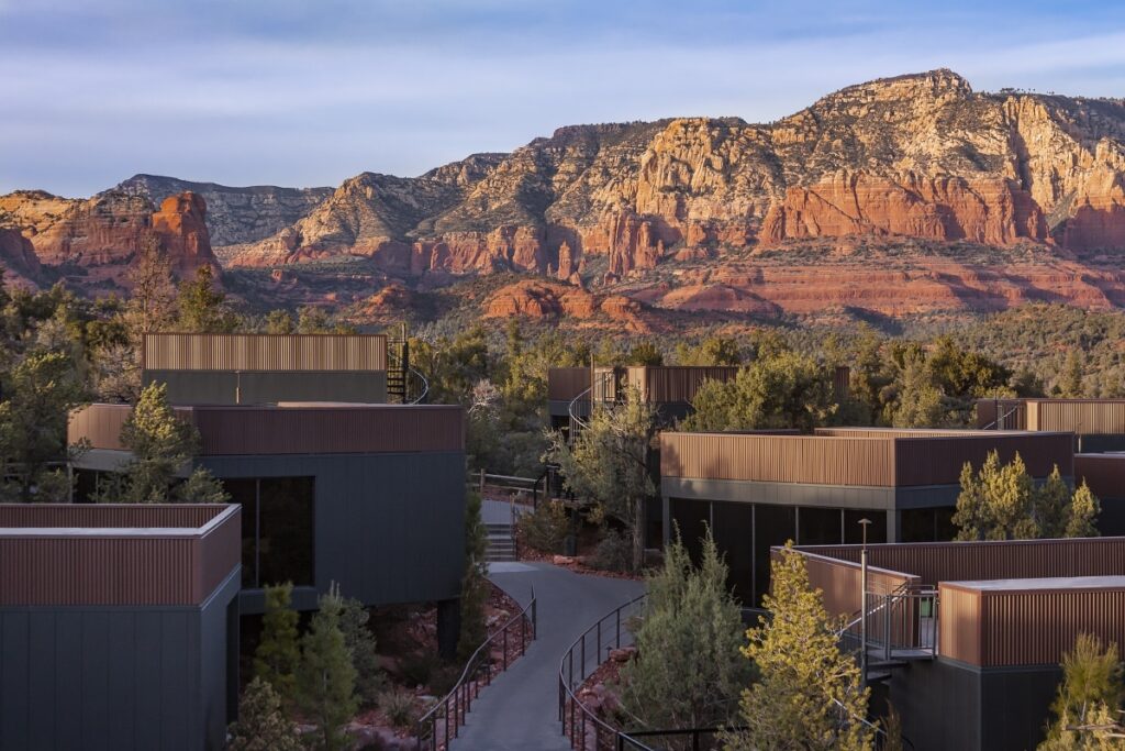 Hotel exterior with mountains in the background